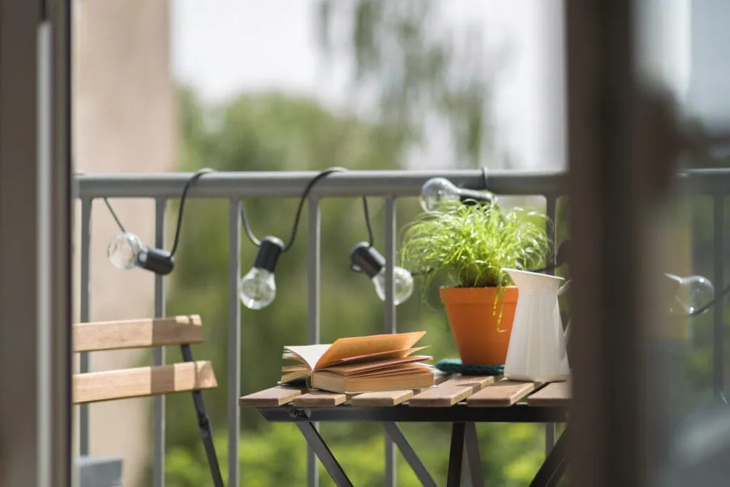 How to Decorate Your Apartment Balcony (Plus, Some Design Inspiration to Get You Started)