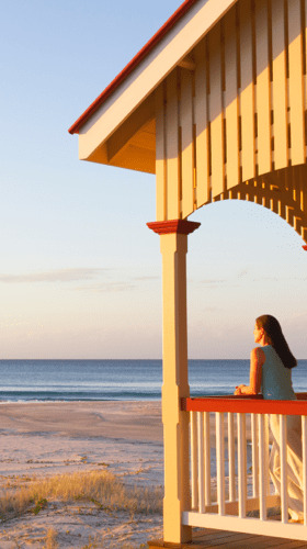 donna che guarda il logo della spiaggia 